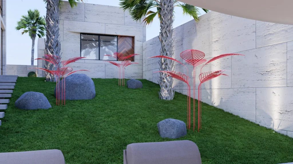 Green side garden corridor with stepping-stone path, palm trees, sculptural planting, and stone-clad villa walls.